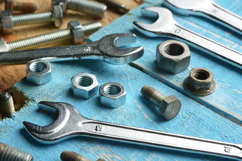 HP_A_009-2-iStock-958092604 Tool set on a table and blue background | 4 Important Heat Pump Maintenance Tips | Cedar Park, TX
