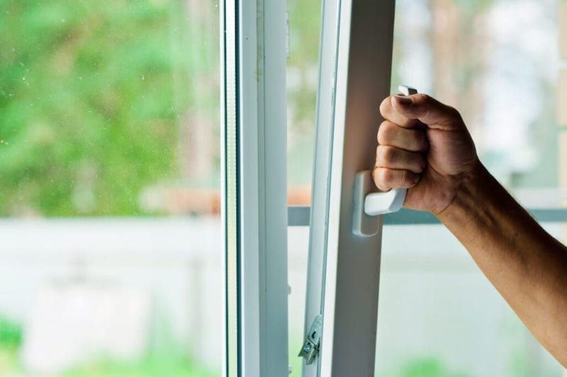 Sliding door opening to the outside in the spring time.