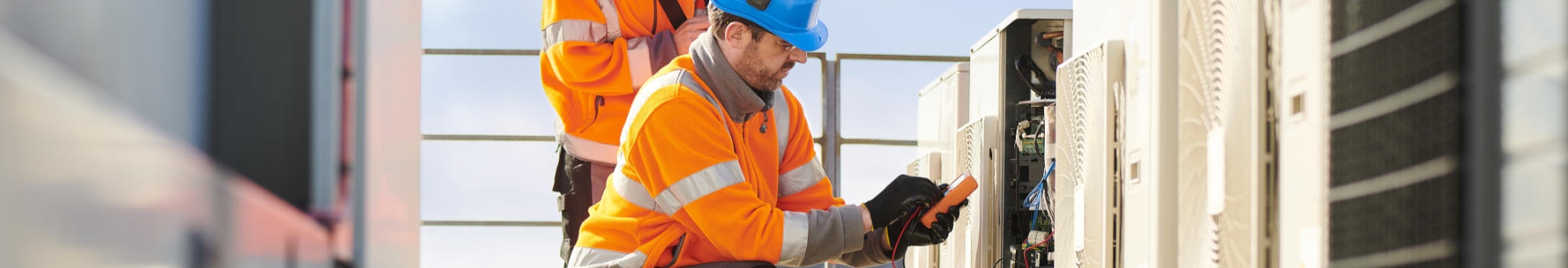 aircon engineers commercial hvac maintenance on roof