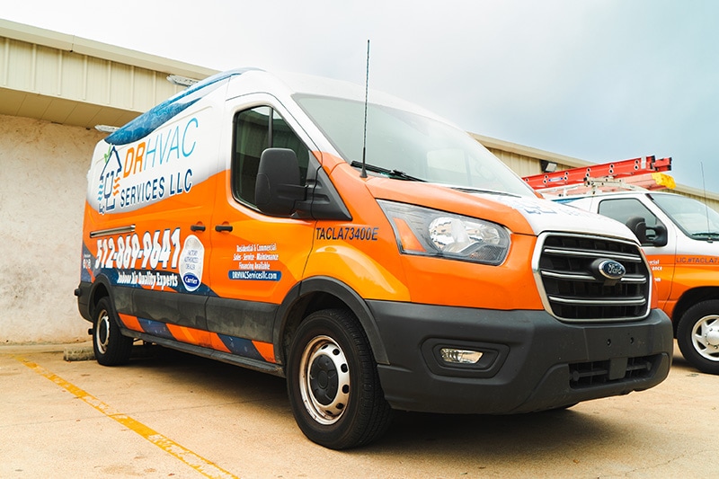 Front right profile of a DR HVAC Services truck.